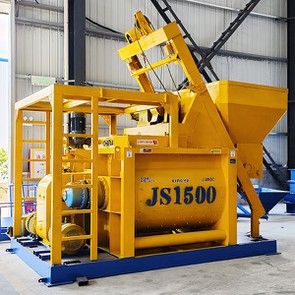 JS1500 twin-shaft concrete mixer with skip hoist assembly