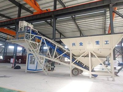 Portable concrete batching plant with compact intelligent control cabin for remote site operations