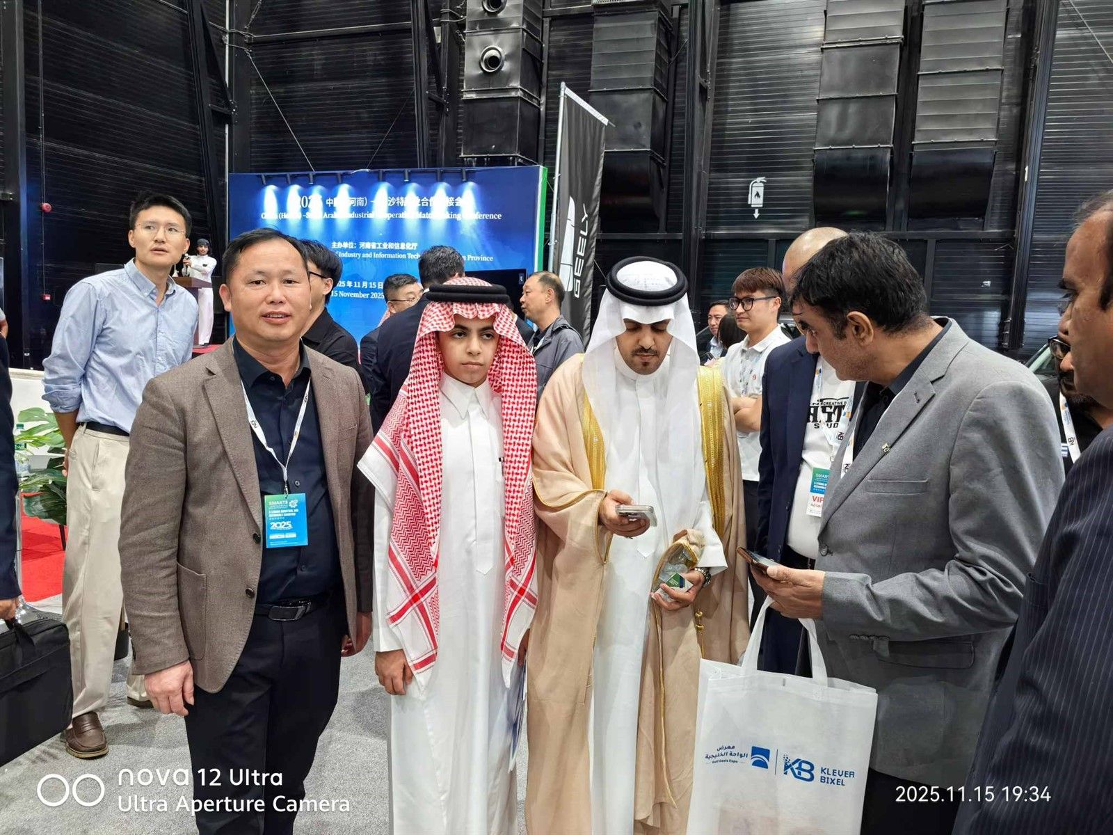 Xingye Machinery technical team discussing HZS-series batching plant configurations with Saudi contractors at Riyadh Expo