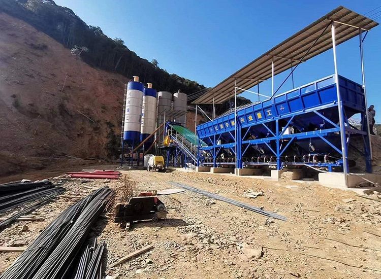 Automated HZS series stationary concrete batching plant featuring centralized PLC control room and twin-shaft mixer