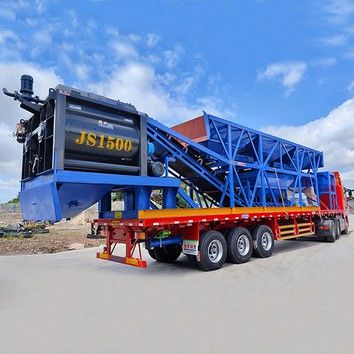 Portable concrete mixing plant with integrated control cabin and aggregate batcher
